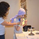 Mariana recebe a Primeira Comunhão em hospital / Foto: ACS IBCC Oncologia